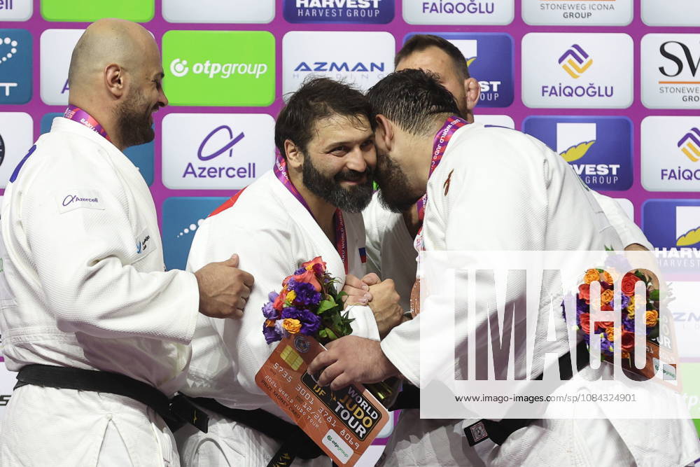 AZERBAIJAN, BAKU - OCTOBER 10, 2026: Azerbaijan s Ushangi Kokauri, Russia s Inal Tasoev and Azerbaijan s Kanan Nasibov (L-R) celebrate their silver, gold and bronze medals respectively during a victory ceremony for the men s heavyweight event as the 2026 World Judo Championships takes place at the National Gymnastics Arena. Mikhail Sinitsyn TASS 99050477