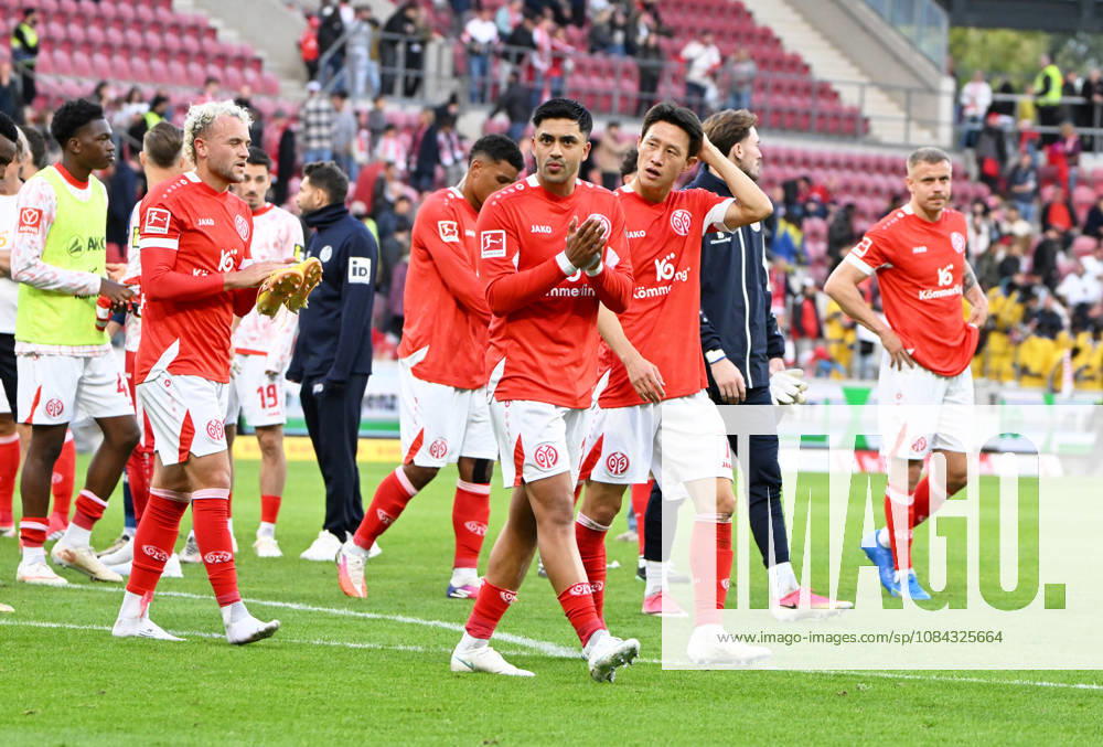Fussball-Bundesliga - Saison 2026 2027 Mewa-Arena Mainz - 10.10.2026 1. FSV Mainz 05 (mz) - Bayer Leverkusen (lev) 3:4 V.li: Benedikt HOLLERBACH (1. FSV Mainz 05), Nadiem AMIRI(1. FSV Mainz 05) , Jae-Sung LEE(1. FSV Mainz 05) DFL REGULATIONS PROHIBIT ANY USE OF PHOTOGRAPHS AS IMAGE SEQUENCES AND OR QUASI VIDEO NATIONAL AND INTERNATIONAL NEWS AGENCIES OUT Fussball-Bundesliga - 1. FSV Mainz 05