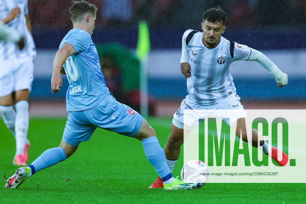 FC Zürich gegen FC Thun Brack Super League 10. Oktober 2026 Nico Maier (30, FC Thun, li.) im Zweikampf mit Bledian Krasniqi (7, FC Zürich) wahrend dem Fussballspiel Brack Super League, FC Zürich gegen FC Thun, 10. Oktober 2026, Stadion Letzigrund, Zürich, Schweiz. Zürich Stadion Letzigrund Zürich Schweiz