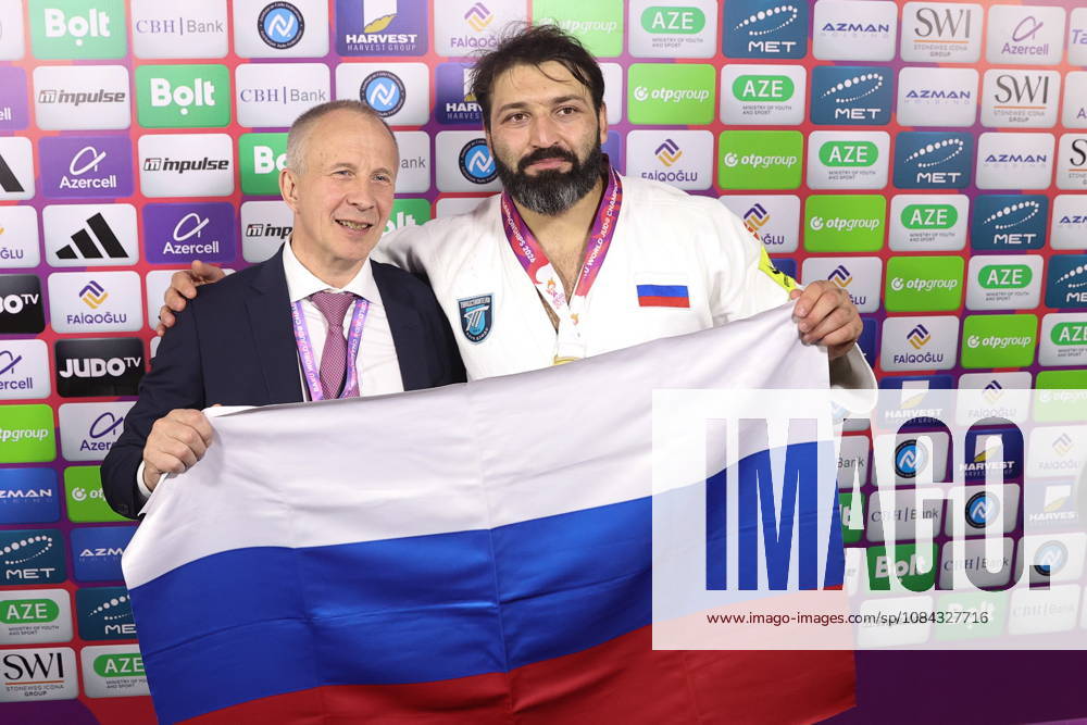 AZERBAIJAN, BAKU - OCTOBER 10, 2026: Sergei Soloveychik (L), President of the Russian Judo Federation, poses with judoka Inal Tasoev to celebrate the latter s gold medal during a victory ceremony for the men s heavyweight event as the 2026 World Judo Championships takes place at the National Gymnastics Arena. Mikhail Sinitsyn TASS 99051896