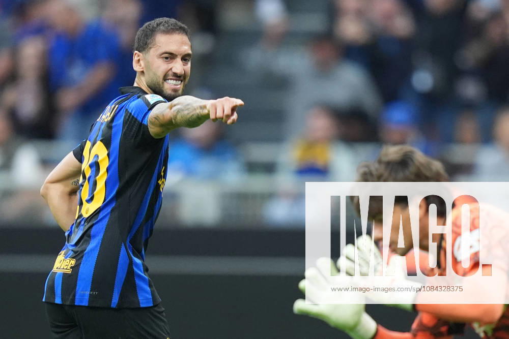 Inter Milan s Hakan Calhanoglu celebrates after scoring 2-0 during the Serie A soccer match between Inter and Parma at San Siro Stadium in Milan , Italy - October 10 , 2026. - Soccer