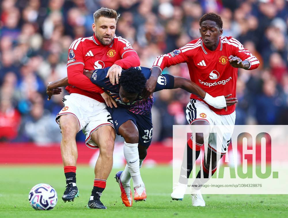 Mohammed Kudus of Tottenham Hotspur in between Luke Shaw and Kobbie Mainoo of Manchester United, ManU Manchester United v Tottenham Hotspur, Premier League, Football, Old Trafford, Manchester, UK - 10 Oct 2026Manchester Old Trafford United Kingdom