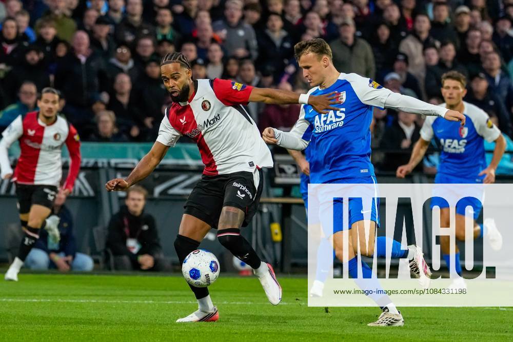 , Stadion Feijenoord (De Kuip) , season 2026 2027 , Dutch Eredivisie football , match between Feyenoord and AZ , Picture shows Feyenoord player Jeremiah St.Juste and AZ player Peer Koopmeiners Feyenoord - AZ x208115896x