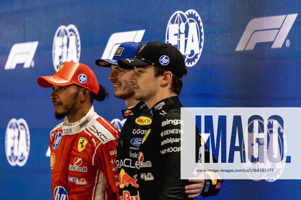 Lewis Hamilton of Great Britain and Scuderia Ferrari HP, Max Verstappen of the Netherlands and Oracle Red Bull Racing and Charles Leclerc of Monaco and Scuderia Ferrari HP at Parc Ferme after qualifying for F1 Grand Prix race of Singapore at Marina Bay Street Circuit on October 10, 2026 in Singapore, Singapore. (Photo by Qian Jun SPP-Paddocker)