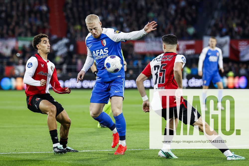 ROTTERDAM - (lr) Oussama Targhalline of Feyenoord, Mexx Meerdink of AZ Alkmaar, Mika Marmol of Feyenoord during the Dutch Eredivisie match between Feyenoord and AZ Alkmaar at Feyenoord stadium De Kuip on 10 October 2026 in Rotterdam, the Netherlands. BAS CZERWINSKI ANP Eredivisie 2026 27 ANPxSportx IVx 572040699 originalFilename: 572040699