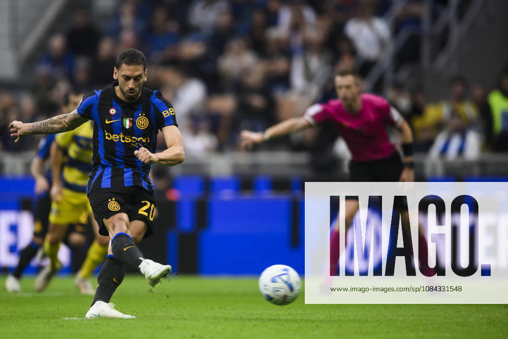 FC Internazionale v Parma Calcio - Serie A Hakan Calhanoglu of FC Internazionale scores a goal from a penalty kick during the Serie A football match between FC Internazionale and Parma Calcio. Milan Italy