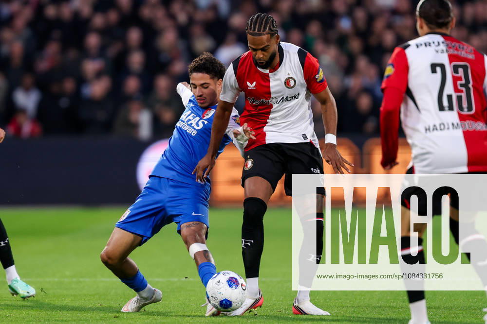 2026-10-10 Feyenoord v AZ Alkmaar - Dutch Eredivisie ROTTERDAM, NETHERLANDS - OCTOBER 10: Ro-Zangelo Daal of AZ Alkmaar battles for the ball with Jeremiah St. Juste of Feyenoord during the Dutch Eredivisie match between Feyenoord and AZ Alkmaar at Stadion Feijenoord on October 10, 2026 in Rotterdam, Netherlands. Rotterdam Stadion Feijenoord Netherlands Content not available for redistribution in The Netherlands directly or indirectly through any third parties.
