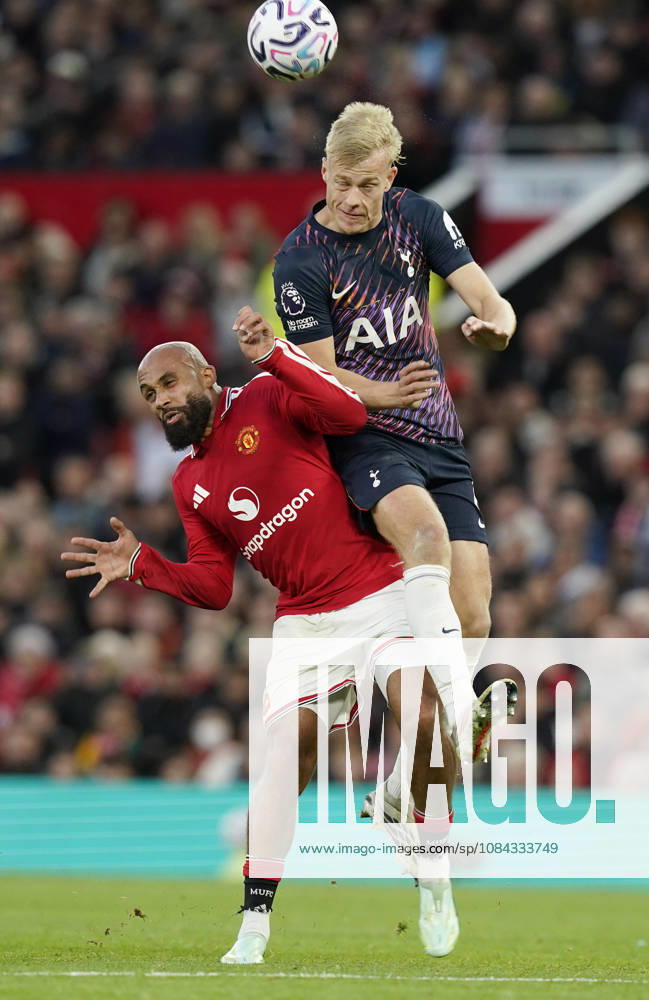 Manchester, England, 10th October 2026. Jan Paul van Hecke of Tottenham tussles with Bryan Mbeumo of Manchester United, ManU during the Manchester United vs Tottenham Hotspur Premier League match at Old Trafford, Manchester. Picture credit should read: Andrew Yates Sportimage . SPI_043_AY_MANUTD_SPURS SPI-5058-0043