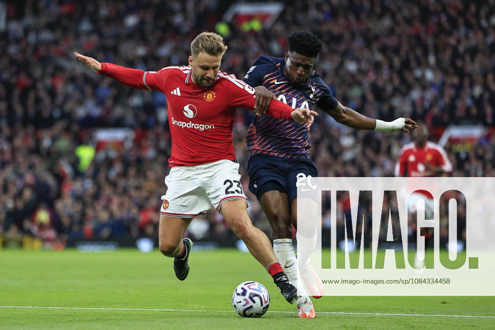 Manchester United, ManU v Tottenham Hotspur, Premier League Luke Shaw (23) of Manchester United and Mohammed Kudus (20) of Tottenham Hotspur challenge for the ball during the Premier League match between Manchester United and Tottenham Hotspur at Old Trafford, Manchester, UK on 10 October 2026. Manchester Old Trafford Greater Manchester UK Editorial use only DataCo restrictions apply See www.football-dataco.com ,