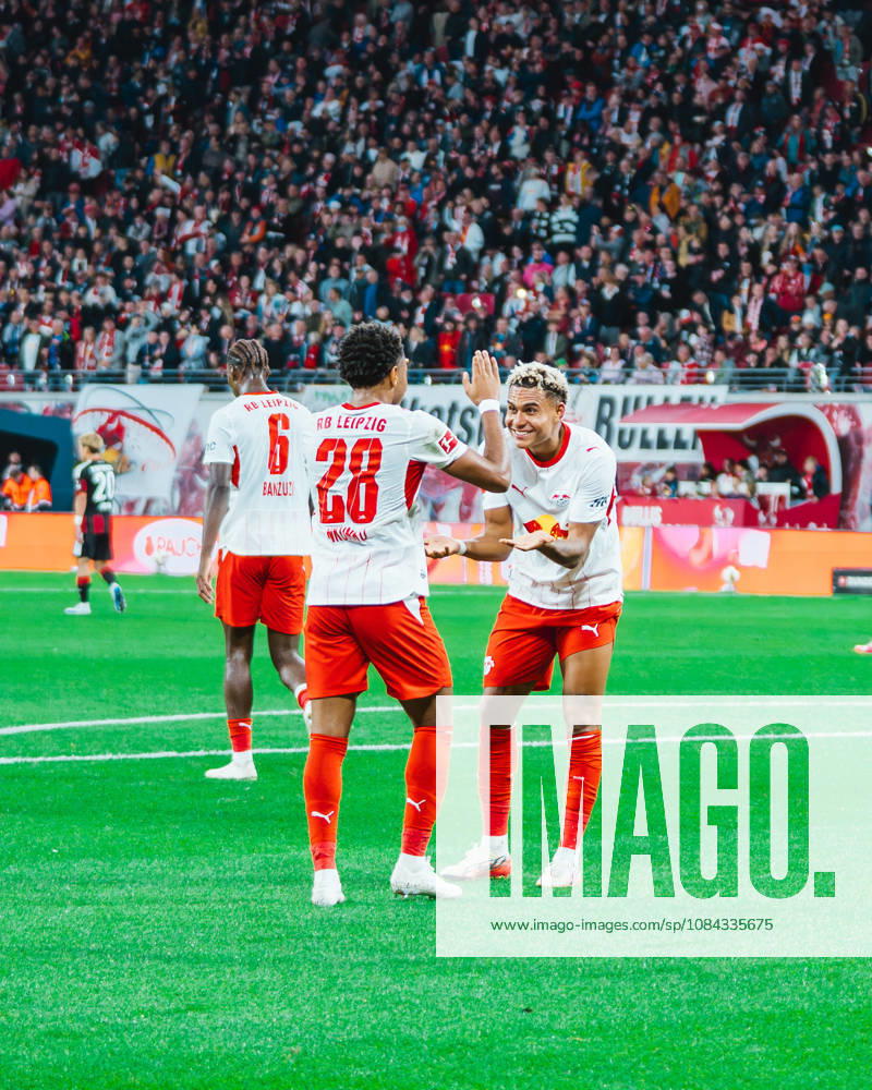 Christopher Nkunku (RB Leipzig, 28) celebrates with Antonio Nusa (RB Leipzig, 7) RB Leipzig vs Eintracht Frankfurt, Bundesliga, Germany, Football, 26 27, GER, Leipzig, Red Bull Arena Stadium DFL regulations prohibit any use of photographs as image sequences and or quasi-video.DFL regulations prohibit any use of photographs as image sequences and or quasi-video. Leipzig Red Bull Arena, Leipzig Sachsen GER