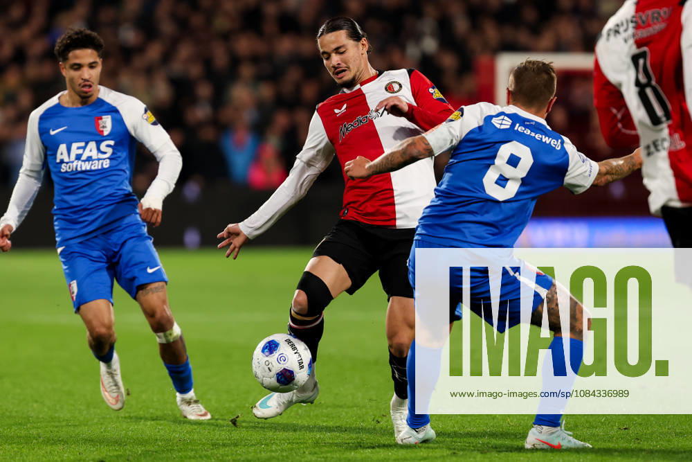 2026-10-10 Feyenoord v AZ Alkmaar - Dutch Eredivisie ROTTERDAM, NETHERLANDS - OCTOBER 10: Anis Hadj Moussa of Feyenoord is challenged by Jordy Clasie of AZ Alkmaar during the Dutch Eredivisie match between Feyenoord and AZ Alkmaar at Stadion Feijenoord on October 10, 2026 in Rotterdam, Netherlands. Rotterdam Stadion Feijenoord Netherlands Content not available for redistribution in The Netherlands directly or indirectly through any third parties.
