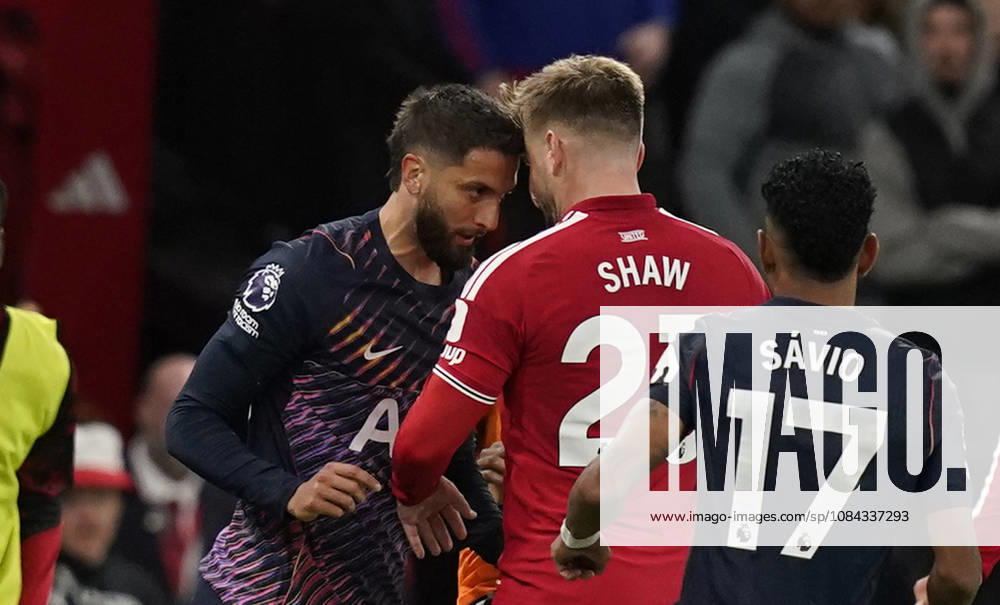 Manchester, England, 10th October 2026. Rodrigo Bentancur of Tottenham Hotspur (L) headsets Luke Shaw of Manchester United, ManU resulting in a red card during the Manchester United vs Tottenham Hotspur Premier League match at Old Trafford, Manchester. Picture credit should read: Andrew Yates Sportimage . SPI_045_AY_MANUTD_SPURS SPI-5058-0045