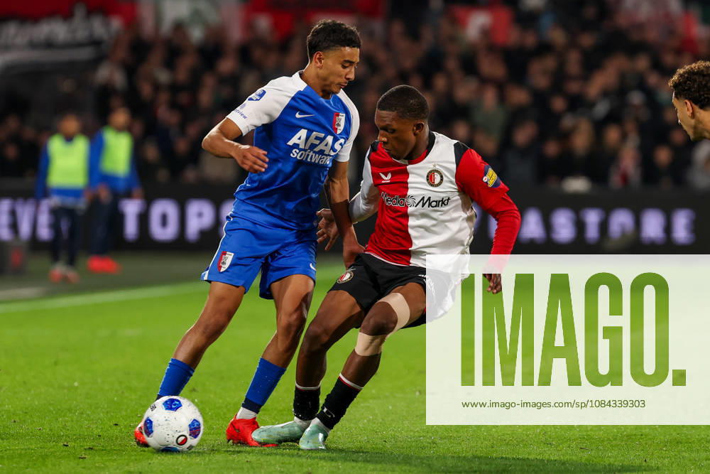 2026-10-10 Feyenoord v AZ Alkmaar - Dutch Eredivisie ROTTERDAM, NETHERLANDS - OCTOBER 10: Ayoub Oufkir of AZ Alkmaar battles for the ball with Givairo Read of Feyenoord during the Dutch Eredivisie match between Feyenoord and AZ Alkmaar at Stadion Feijenoord on October 10, 2026 in Rotterdam, Netherlands. Rotterdam Stadion Feijenoord Netherlands Content not available for redistribution in The Netherlands directly or indirectly through any third parties.