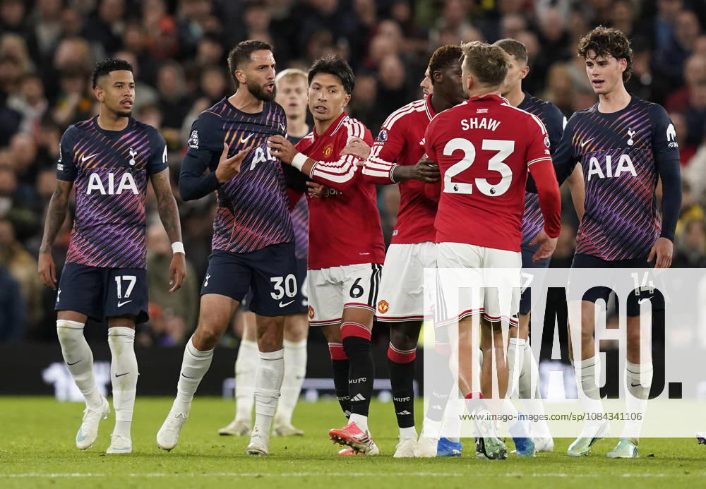 Manchester, England, 10th October 2026. Rodrigo Bentancur of Tottenham Hotspur (2L) confronts Luke Shaw of Manchester United, ManU after head butting him during the Manchester United vs Tottenham Hotspur Premier League match at Old Trafford, Manchester. Picture credit should read: Andrew Yates Sportimage . SPI_063_AY_MANUTD_SPURS SPI-5058-0063