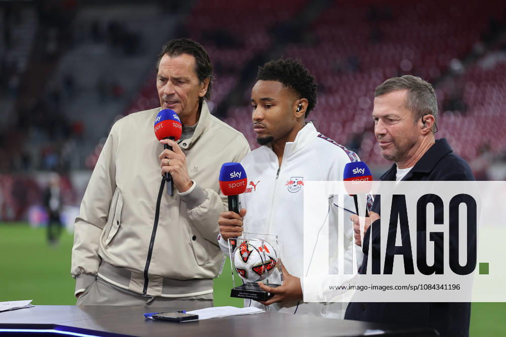Fussball 1.Bundesliga, RB Leipzig - Eintracht Frankfurt v.l. Sebastian Hellmann (SKY) Christopher Nkunku (RB Leipzig) TV-Experte Lothar Matthäus Leipzig