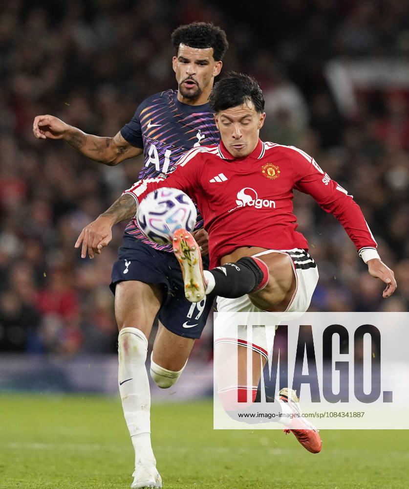 Manchester, England, 10th October 2026. Dominic Solanke of Tottenham Hotspur (L) is challenged by Lisandro Martinez of Manchester United, ManU during the Manchester United vs Tottenham Hotspur Premier League match at Old Trafford, Manchester. Picture credit should read: Andrew Yates Sportimage . SPI_068_AY_MANUTD_SPURS SPI-5058-0068