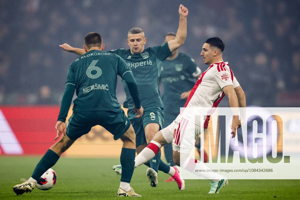 AMSTERDAM - (lr) Darko Nejašmić of NEC Nijmegen, Bryan Linssen of NEC Nijmegen, Oscar Gloukh of Ajax during the Dutch Eredivisie match between AFC Ajax and NEC Nijmegen at the Johan Cruijff ArenA on October 10, 2026 in Amsterdam, the Netherlands. MAURICE VAN STEEN ANP Eredivisie 2026 27 ANPxSportx IVx 572057564 originalFilename: 572057564