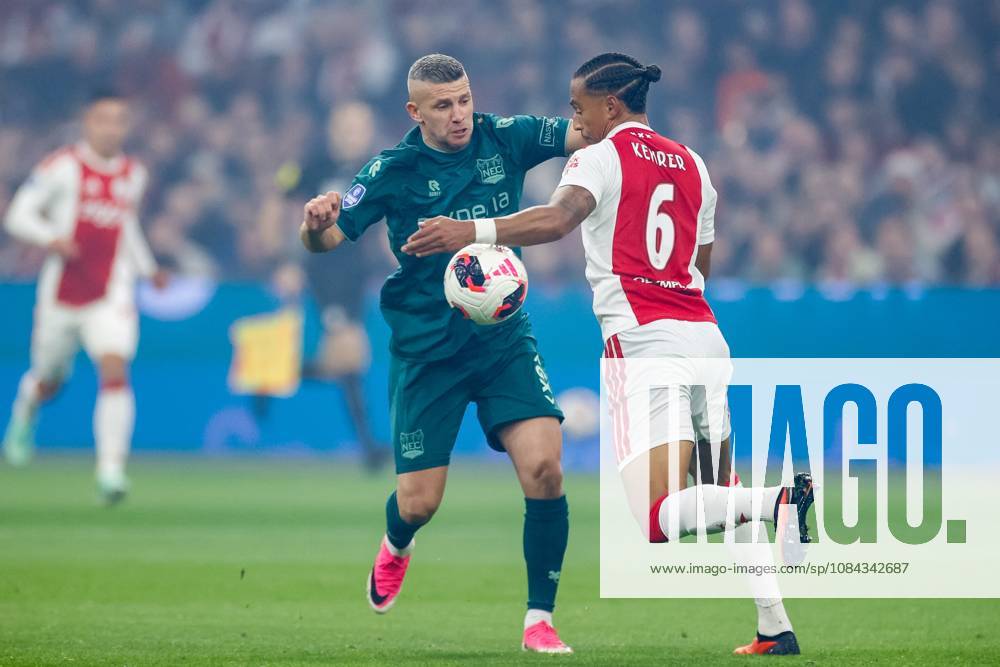 , JohanCruyff Arena , season 2026 2027 , Dutch Eredivisie football , Match between Ajax and NEC Nijmegen , picture shows NEC Nijmegen player Bryan Linssen and Ajax player Thilo Kehrer battle for possession Ajax - NEC x208125187x