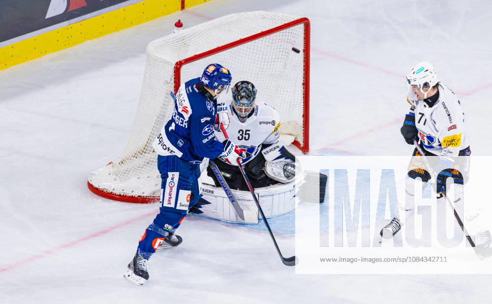 Ice hockey, Eishockey National League Regular Season - ZSC Lions vs HC Frib Zurich, Switzerland, 10th Oct 2026: 31st minute: 14 Chris Baltisberger (ZSC Lions) deflects the puck past goaltender 35 Ludovic Waeber (Fribourg) to make it 4-3. Defenseman 7 Benoit Jecker (Fribourg) has no chance.