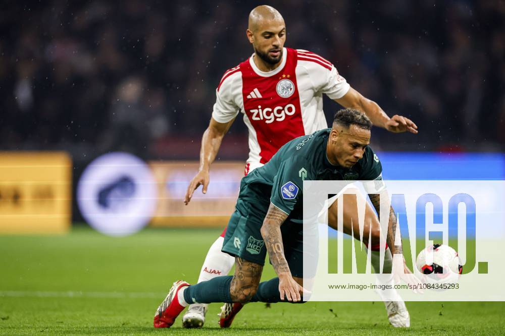 AMSTERDAM - (lr) Sofyan Amrabat of Ajax, Tjaronn Chery of NEC Nijmegen during the Dutch Eredivisie match between AFC Ajax and NEC Nijmegen at the Johan Cruijff ArenA on October 10, 2026 in Amsterdam, the Netherlands. MAURICE VAN STEEN ANP Eredivisie 2026 27 ANPxSportx IVx 572059559 originalFilename: 572059559