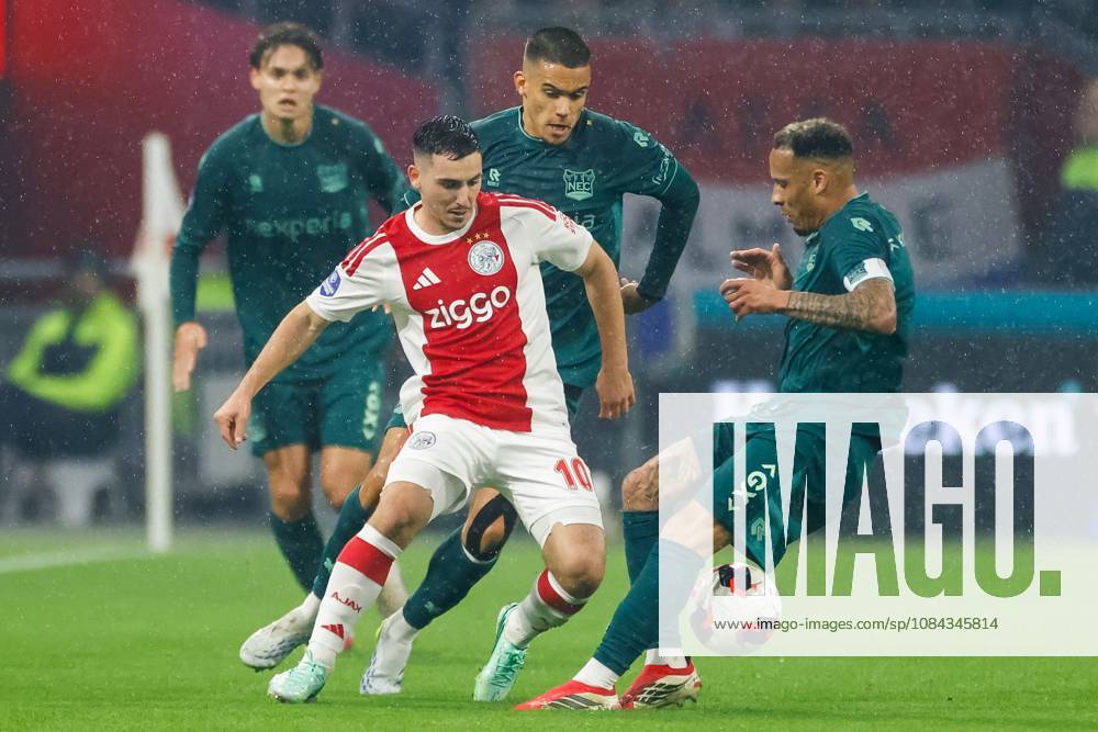 , JohanCruyff Arena , season 2026 2027 , Dutch Eredivisie football , Match between Ajax and NEC Nijmegen , picture shows Ajax player Oscar Gloukh and NEC Nijmegen player Tjaronn Chery battle for the ball Ajax - NEC x208126065x