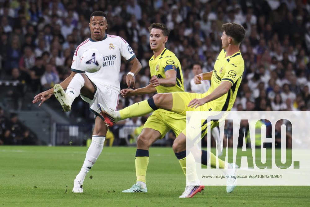 Real Madrid v Villarreal - La Liga EA Sports 2026 27 October 10, 2026, Estadio Santiago Bernabeu, Madrid, Spain: Kylian Mbappe of Real Madrid is defended by Navarro Pau and Juan Foyth of Villarreal during La Liga EA Sports match between Real Madrid and Villarreal at Estadio Santiago Bernabeu on October 10, 2026 in Madrid, Spain. Madrid Estadio Santiago Bernabeu Madrid Spain