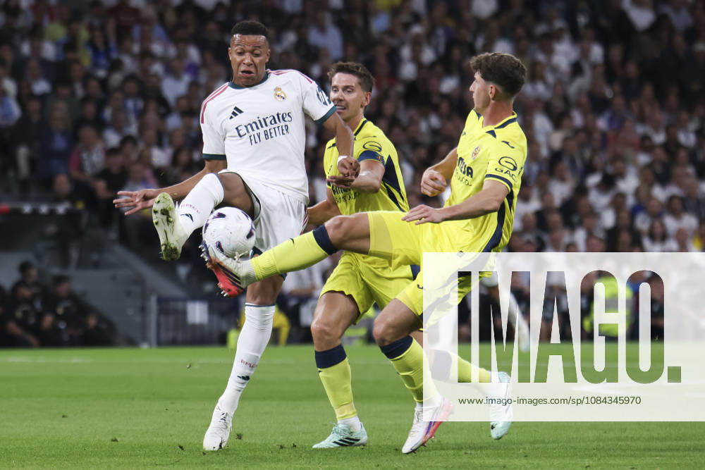 Real Madrid v Villarreal - La Liga EA Sports 2026 27 October 10, 2026, Estadio Santiago Bernabeu, Madrid, Spain: Kylian Mbappe of Real Madrid is defended by Navarro Pau and Juan Foyth of Villarreal during La Liga EA Sports match between Real Madrid and Villarreal at Estadio Santiago Bernabeu on October 10, 2026 in Madrid, Spain. Madrid Estadio Santiago Bernabeu Madrid Spain