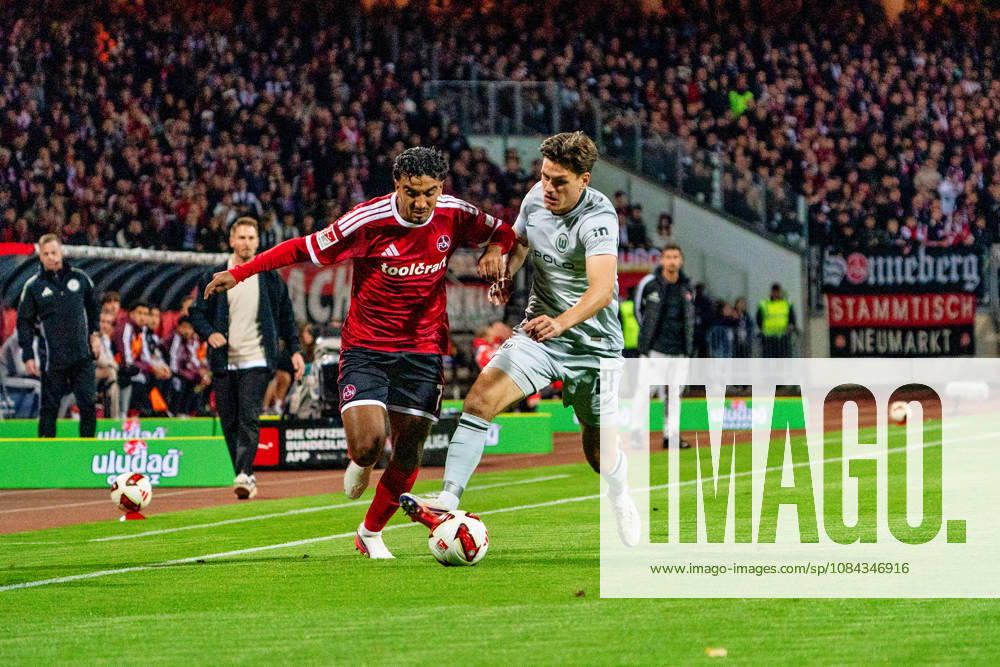 Rayan Ghrieb (1. FC Nuernberg, 07) und Joakim Maehle (VfL Wolfsburg, 21), GER, 1. FC Nuernberg vs. VfL Wolfsburg, Fussball, 2. Bundesliga, 7. Spieltag, Saison 2026 2027, 10.10.2026, DFL REGULATIONS PROHIBIT ANY USE OF PHOTOGRAPHS AS IMAGE SEQUENCES AND OR QUASI-VIDEO, GER, 1. FC Nuernberg vs. VfL Wolfsburg, Fussball, 2. Bundesliga, 7. Spieltag, Saison 2026 2027, 10.10.2026 Nuernberg