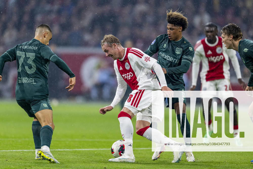 AMSTERDAM - (l-r) AFC Ajax Amsterdam forward Julian Brandt and N.E.C. Nijmegen midfielder Noe Lebreton during the Vriendenloterij Eredivisie match between Ajax and N.E.C. at Johan Cruijff ArenA on 10 October 2026 in Amsterdam, Netherlands. (Photo by DeFodi Images) -