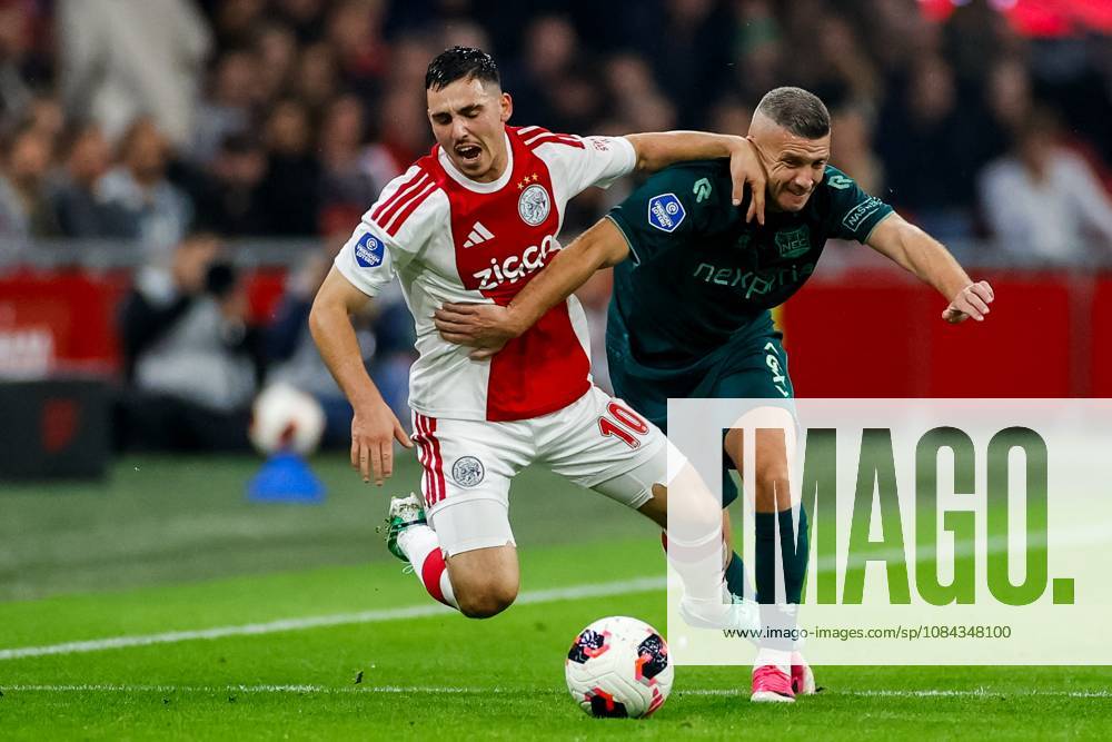 , JohanCruyff Arena , season 2026 2027 , Dutch Eredivisie football , Match between Ajax and NEC Nijmegen , picture shows Ajax player Oscar Gloukh and NEC Nijmegen player Bryan Linssen battle for the ball Ajax - NEC x208128115x