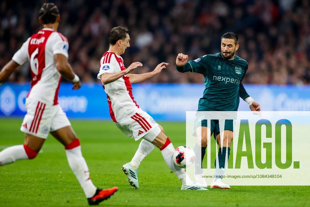 , JohanCruyff Arena , season 2026 2027 , Dutch Eredivisie football , Match between Ajax and NEC Nijmegen , picture shows Ajax player Youri Baas and NEC Nijmegen player Dusan Tadic battle for the ball Ajax - NEC x208128117x