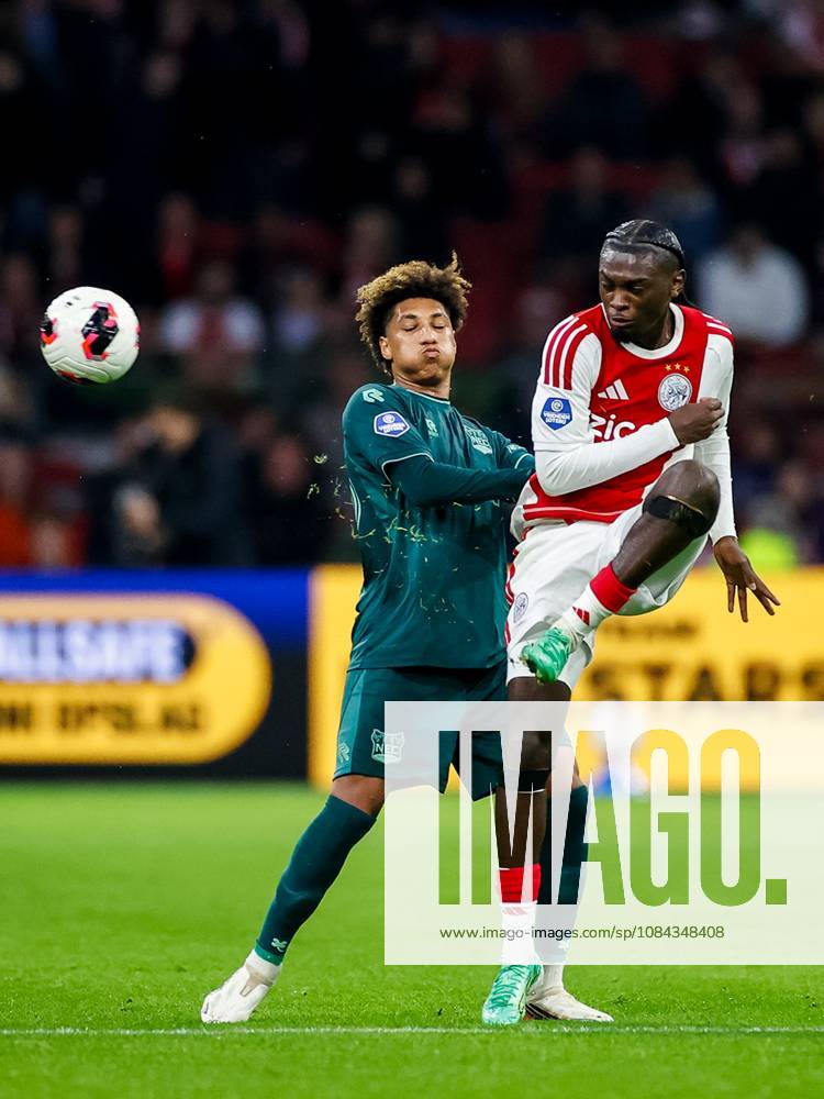 , JohanCruyff Arena , season 2026 2027 , Dutch Eredivisie football , Match between Ajax and NEC Nijmegen , picture shows NEC Nijmegen player Noe Lebreton challenges Ajax player Jorthy Mokio Ajax - NEC x208128127x