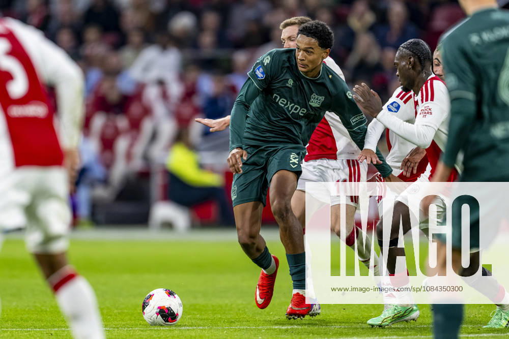 AMSTERDAM - (l-r) N.E.C. Nijmegen defender Kevin Kers and AFC Ajax Amsterdam defender Jorthy Mokio during the Vriendenloterij Eredivisie match between Ajax and N.E.C. at Johan Cruijff ArenA on 10 October 2026 in Amsterdam, Netherlands. (Photo by DeFodi Images) -