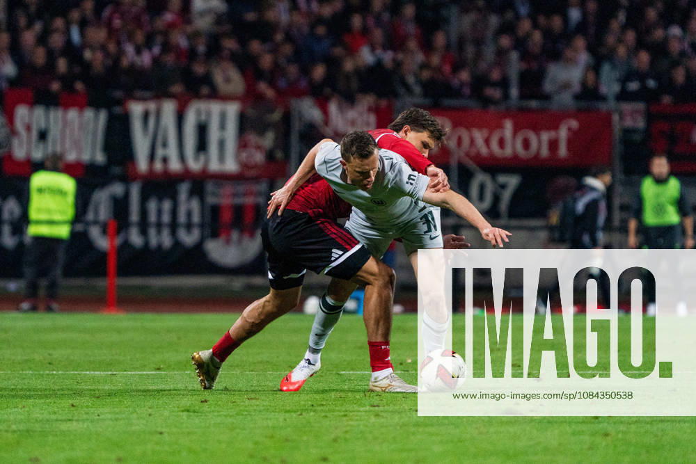 Yannick Gerhardt (VfL Wolfsburg, 31) und Fynn Otto (1. FC Nuernberg, 20), GER, 1. FC Nuernberg vs. VfL Wolfsburg, Fussball, 2. Bundesliga, 7. Spieltag, Saison 2026 2027, 10.10.2026, DFL REGULATIONS PROHIBIT ANY USE OF PHOTOGRAPHS AS IMAGE SEQUENCES AND OR QUASI-VIDEO, GER, 1. FC Nuernberg vs. VfL Wolfsburg, Fussball, 2. Bundesliga, 7. Spieltag, Saison 2026 2027, 10.10.2026 Nuernberg
