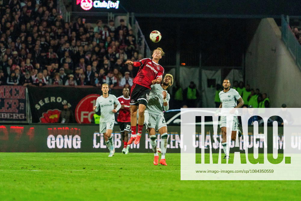 Eric Porstner (1. FC Nuernberg, 41) und Muhammed Damar (VfL Wolfsburg, 20), GER, 1. FC Nuernberg vs. VfL Wolfsburg, Fussball, 2. Bundesliga, 7. Spieltag, Saison 2026 2027, 10.10.2026, DFL REGULATIONS PROHIBIT ANY USE OF PHOTOGRAPHS AS IMAGE SEQUENCES AND OR QUASI-VIDEO, GER, 1. FC Nuernberg vs. VfL Wolfsburg, Fussball, 2. Bundesliga, 7. Spieltag, Saison 2026 2027, 10.10.2026 Nuernberg