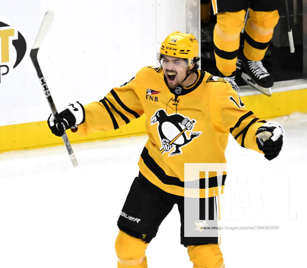 Pittsburgh Penguins left wing Nick Robertson (14) celebrates the 2-1 shootout win against the Dallas Stars at PPG Paints Arena in Pittsburgh on Saturday, October, 10 2026. PIT2026101012 ARCHIExCARPENTER