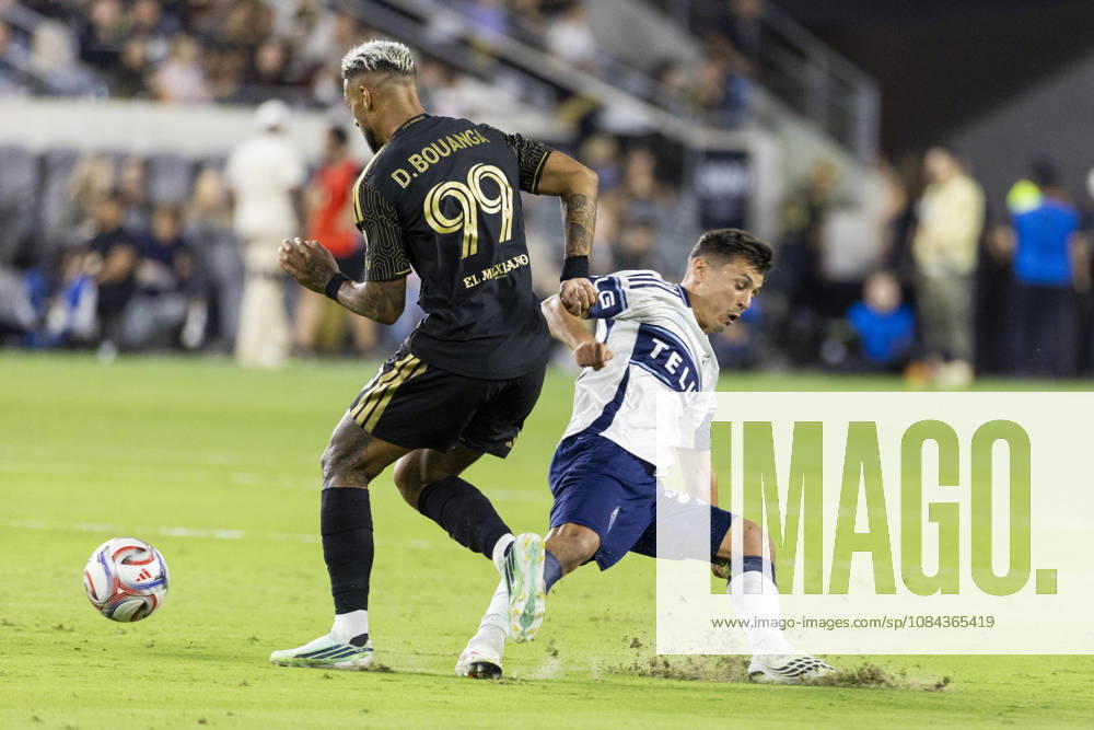 Los Angeles FC striker Denis Bouanga (99) and Vancouver Whitecaps defensive midfielder Andres Cubas (20) vie for the ball during a MLS, Fussball Herren, USA soccer game on Saturday, Oct. 10, 2026 in Los Angeles. Los Angeles USA - ZUMAc68_ 20261010_zaf_c68_036