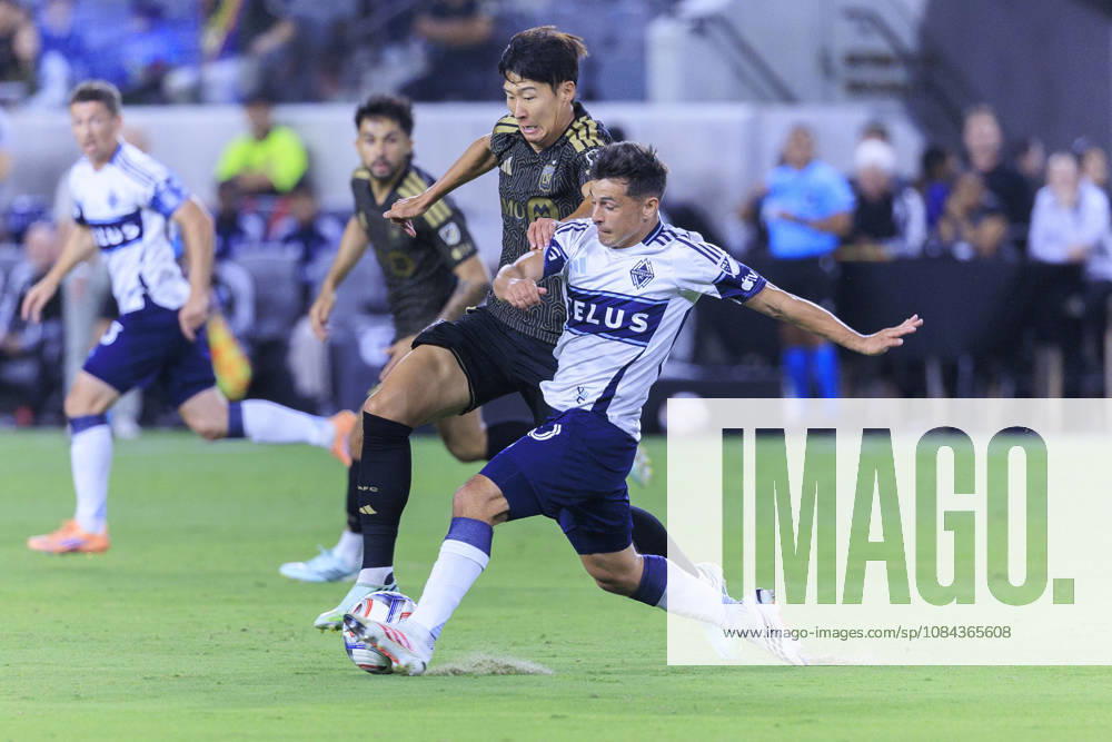 Son Heung-Min 7 of the Los Angeles Football Club and Andres Cubas 20 of the Vancouver Whitecaps struggle for possession of the ball during their regular season MLS, Fussball Herren, USA game on Saturday October 10, 2026 at the BMO Stadium in Los Angeles, California. ARIANA RUIZ PI LAFC Vs. Vancouver Whitecaps - ZUMAp124 20261010_zaa_p124_008