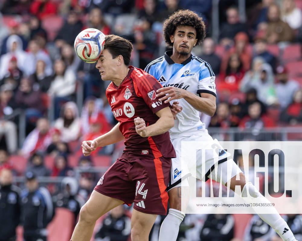 (261011) -- TORONTO, Oct. 11, 2026 -- Alonso Coello (L) of Toronto FC challenges for a header with Jalen Neal of CF Montreal during the 2026 Major League Soccer MLS, Fussball Herren, USA regular season match between Toronto FC and CF Montreal at BMO Field in Toronto, Canada, on Oct. 10, 2026. (Photo by Xinhua) (SP)CANADA-TORONTO-SOCCER-MLS-TORONTO FC VS CF MONTREAL ZouxZheng