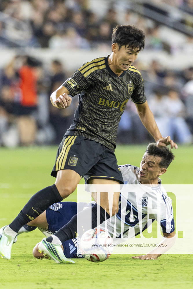 Los Angeles FC attacking midfielder Heung Min Son (7) and Vancouver Whitecaps defensive midfielder Andres Cubas (20) vie for the ball during a MLS, Fussball Herren, USA soccer game on Saturday, Oct. 10, 2026 in Los Angeles. Los Angeles USA - ZUMAc68_ 20261010_zaf_c68_053