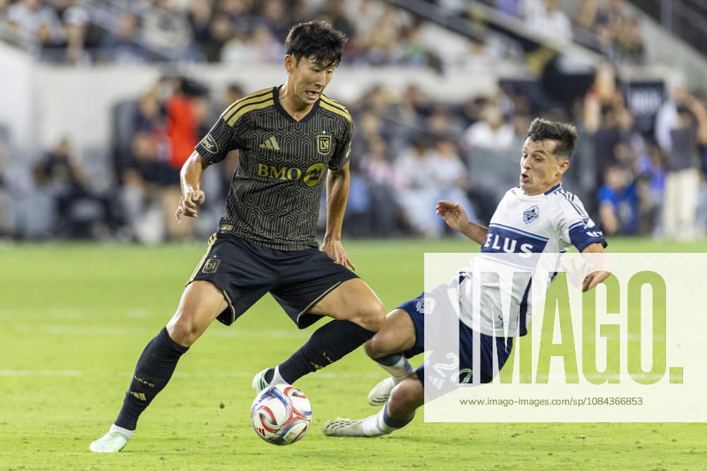 Los Angeles FC attacking midfielder Heung Min Son (7) and Vancouver Whitecaps defensive midfielder Andres Cubas (20) vie for the ball during a MLS, Fussball Herren, USA soccer game on Saturday, Oct. 10, 2026 in Los Angeles. Los Angeles USA - ZUMAc68_ 20261010_zaf_c68_062