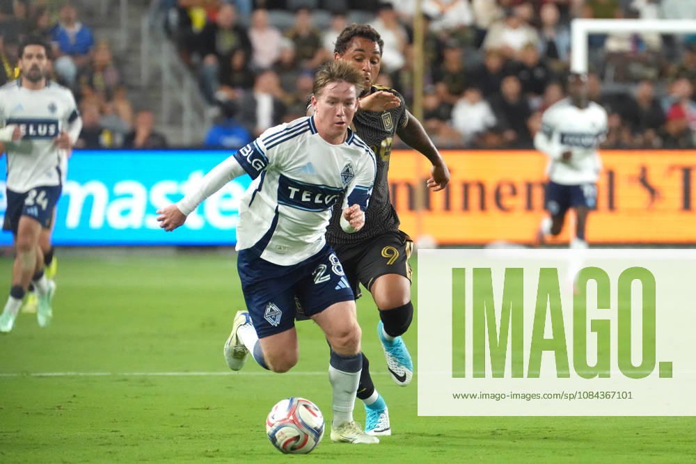Armindo Sieb (R) of Los Angeles in action against Tate Johnson (R) of Vancouver during an MLS, Fussball Herren, USA match between Los Angeles and the Vancouver Whitecaps at BMO Stadium in Los Angeles, United States, 10 October 2026. MLS- Los Angeles vs Vancouver Whitecaps !ACHTUNG: NUR REDAKTIONELLE NUTZUNG!