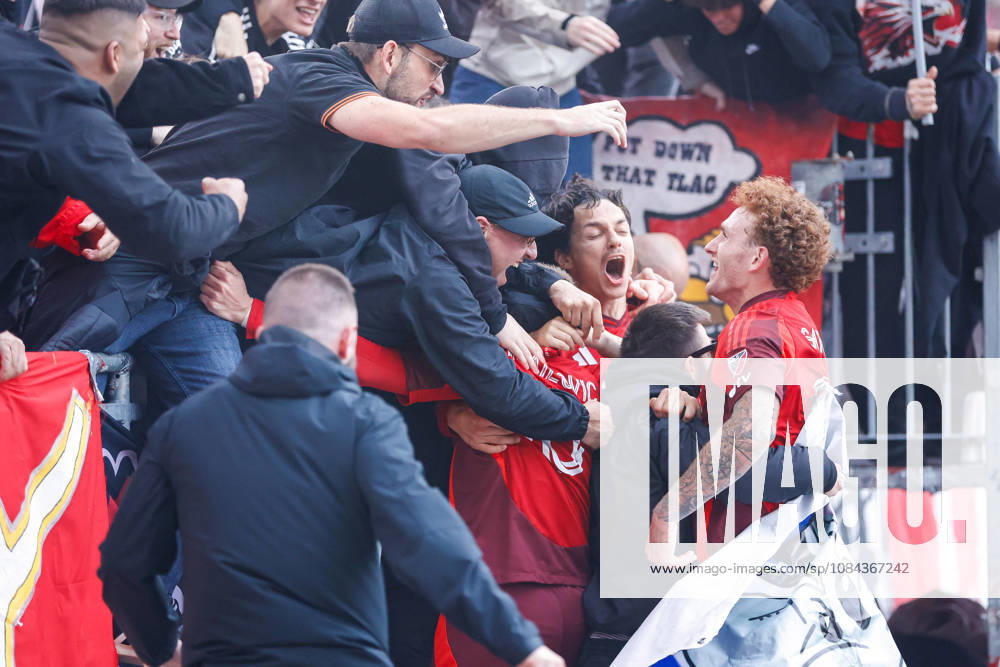 Toronto FC v CF Montreal Djordje Mihailovic 10, Daniel Salloi 20 (C) and Josh Sargent 9 (R) of Toronto FC celebrate a winning goal with fans during a Major League Soccer game against CF Montreal at BMO Field in Toronto, Ontario, Canada, on October 10, 2026. Toronto Ontario Canada