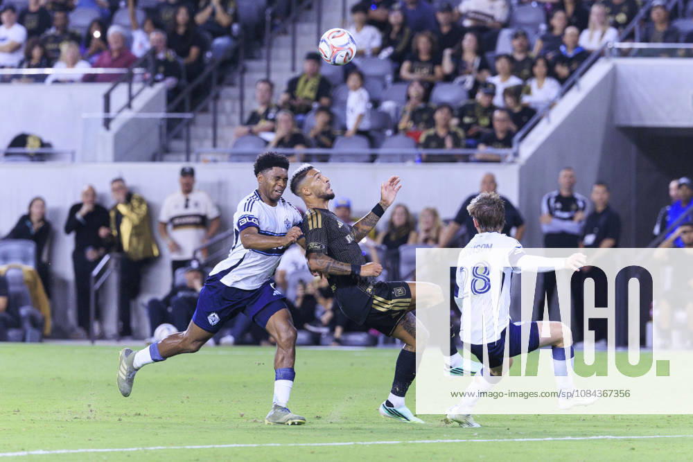Ralph Priso-Mbongue 6 of the Vancouver Whitecaps collides with Denis Bouanga 99 of the Los Angeles Football Club as he receives the ball during their regular season MLS, Fussball Herren, USA game on Saturday October 10, 2026 at the BMO Stadium in Los Angeles, California. LAFC tie with Whitecaps, 1-1. ARIANA RUIZ PI Los Angeles USA - ZUMAp124 20261010_zaa_p124_016