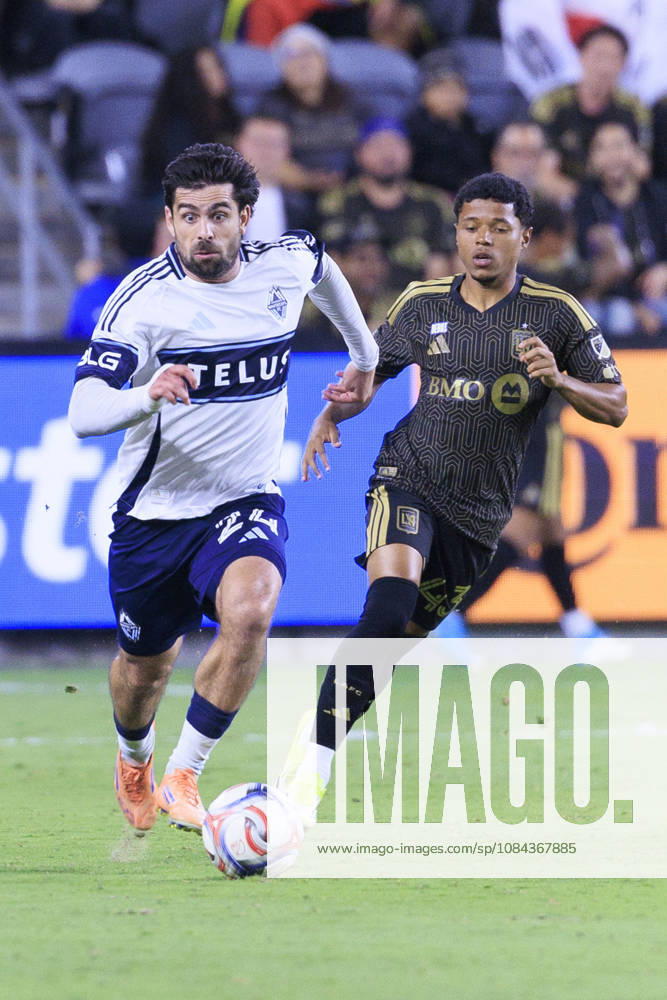 Brian White 24 of the Vancouver Whitecaps takes the ball up the sideline as Thayllon 43 of the Los Angeles Football Club defends during their regular season MLS, Fussball Herren, USA game on Saturday October 10, 2026 at the BMO Stadium in Los Angeles, California. LAFC tie with Whitecaps, 1-1. ARIANA RUIZ PI LAFC Vs. Vancouver Whitecaps - ZUMAp124 20261010_zaa_p124_017
