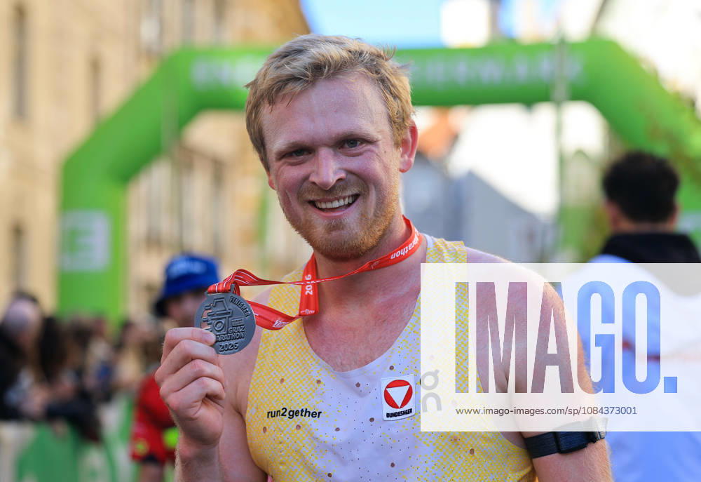 RUNNING - Graz Marathon 2026 GRAZ,AUSTRIA,11.OCT.26 - RUNNING - Graz Marathon. Image shows Leo Holper (AUT). Keywords: medal. GEPAxpictures xWolfgangxGrebien