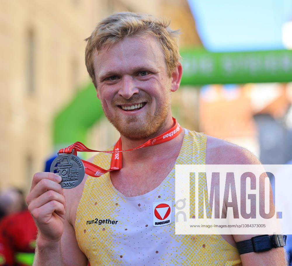RUNNING - Graz Marathon 2026 GRAZ,AUSTRIA,11.OCT.26 - RUNNING - Graz Marathon. Image shows Leo Holper (AUT). Keywords: medal. GEPAxpictures xWolfgangxGrebien