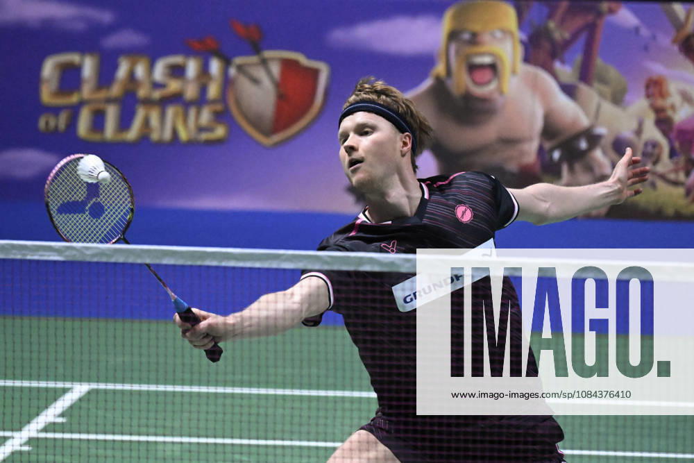 Anders Antonsen of Denmark hits a return during the men s singles match against Yushi Tanaka of Japan (not pictured) during the finals at the badminton Clash of Clans Arctic Open 2026 tournament in Vantaa, Finland, on October 11, 2026. - ANTTI AIMO-KOIVISTO Finland dHAeYG0vCuc