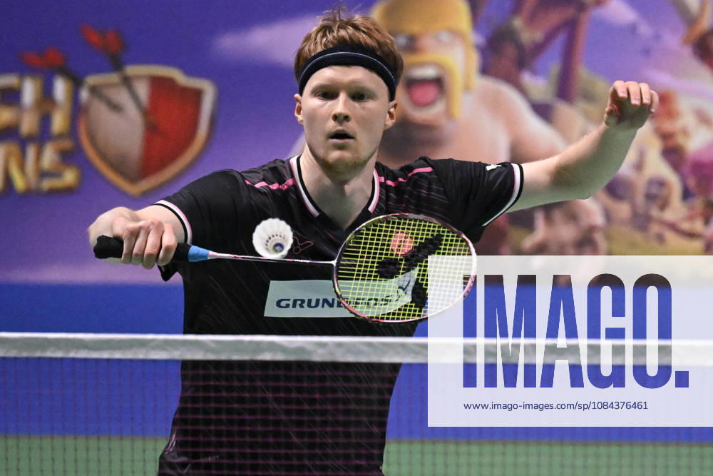 Anders Antonsen of Denmark hits a return during the men s singles match against Yushi Tanaka of Japan (not pictured) during the finals at the badminton Clash of Clans Arctic Open 2026 tournament in Vantaa, Finland, on October 11, 2026. - ANTTI AIMO-KOIVISTO Finland JvOEGZ9Gp60