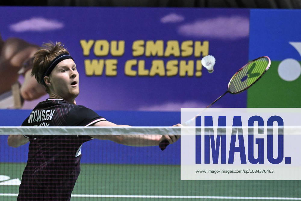 Anders Antonsen of Denmark hits a return during the men s singles match against Yushi Tanaka of Japan (not pictured) during the finals at the badminton Clash of Clans Arctic Open 2026 tournament in Vantaa, Finland, on October 11, 2026. - ANTTI AIMO-KOIVISTO Finland QUFWJCa-i3U
